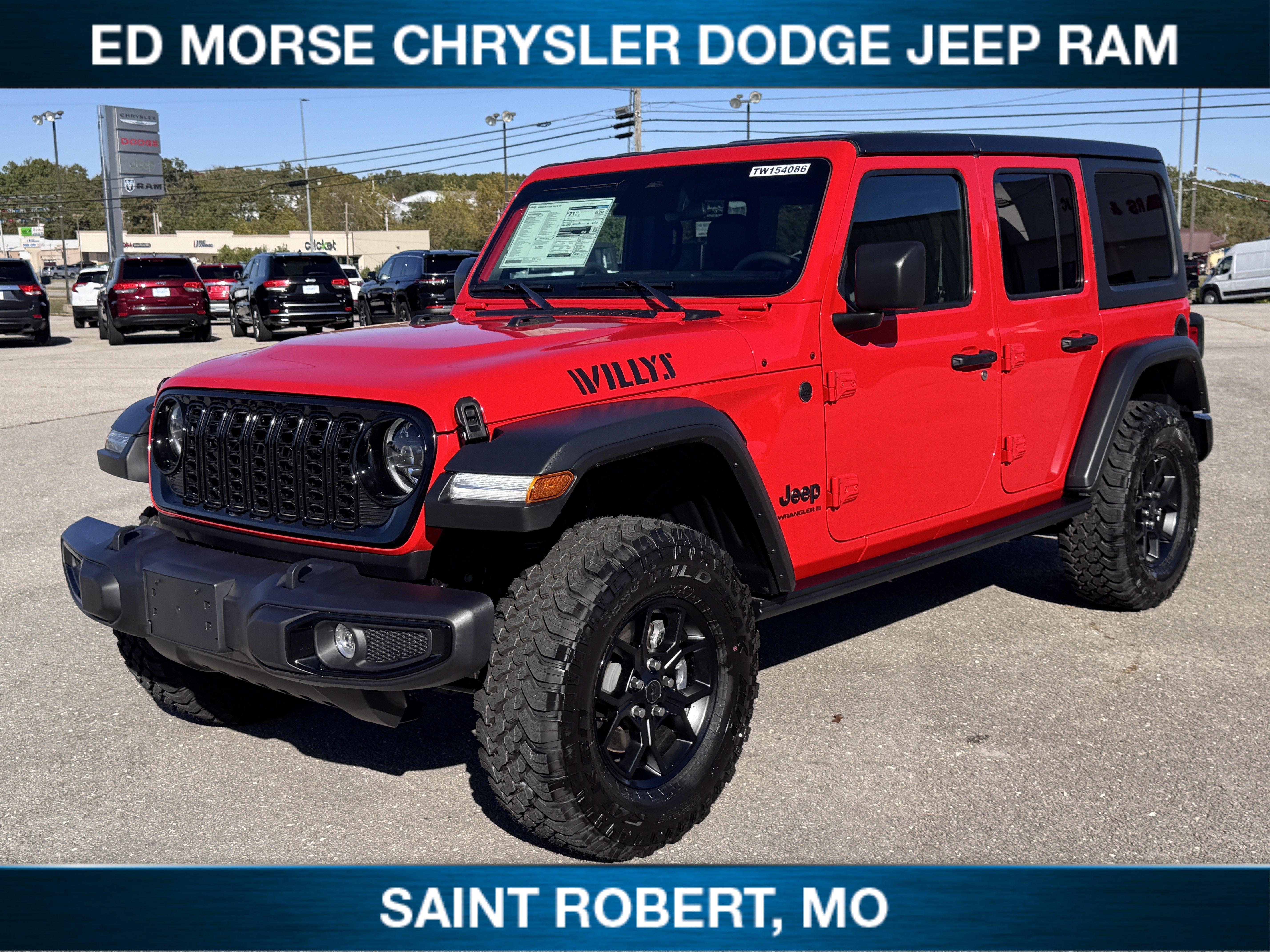 2026 Jeep Wrangler Willys in Firecracker Red Clearcoat — front three-quarter view