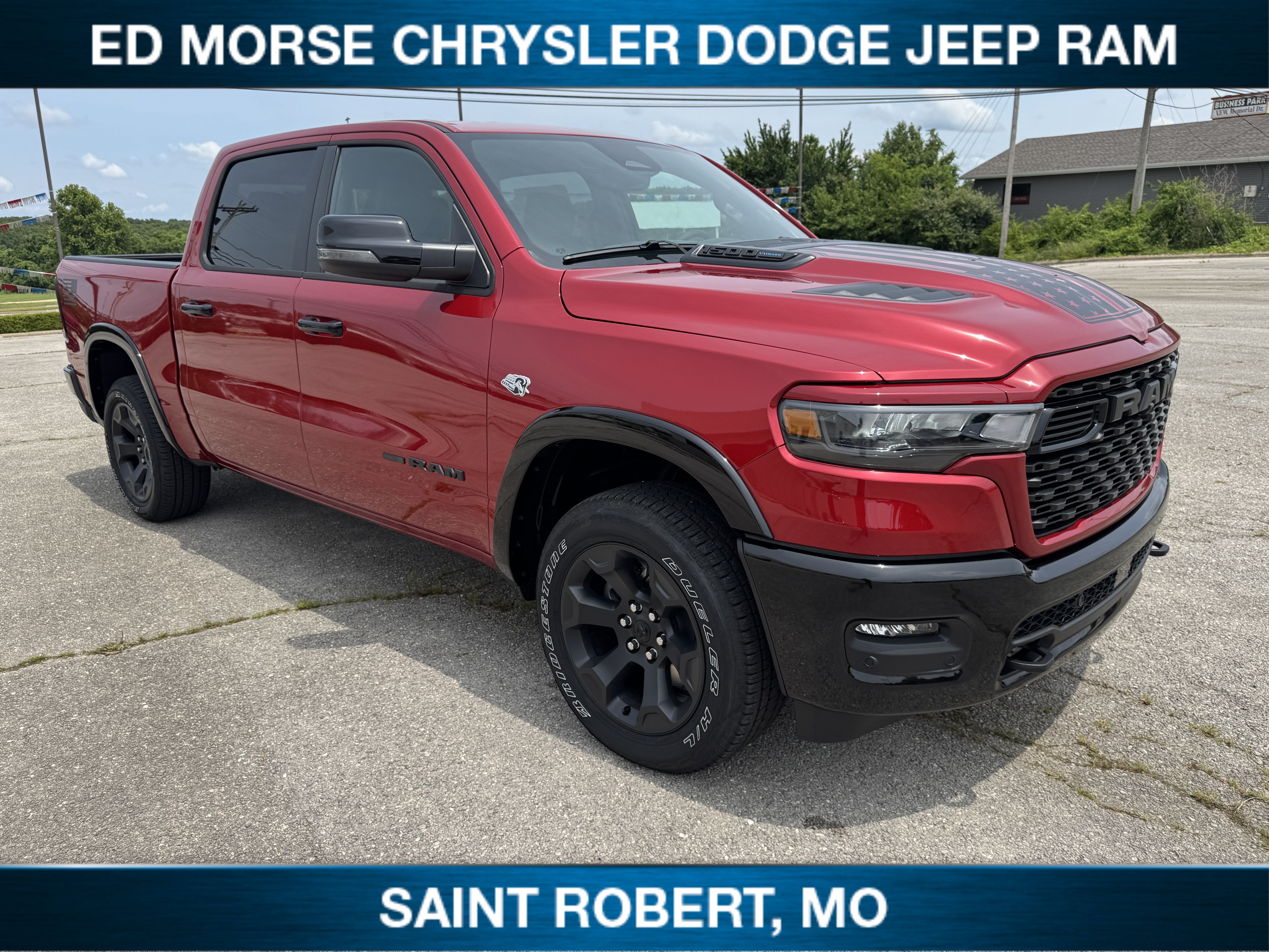 2026 RAM 1500 Big Horn in Molten Red Pearlcoat — front three-quarter view