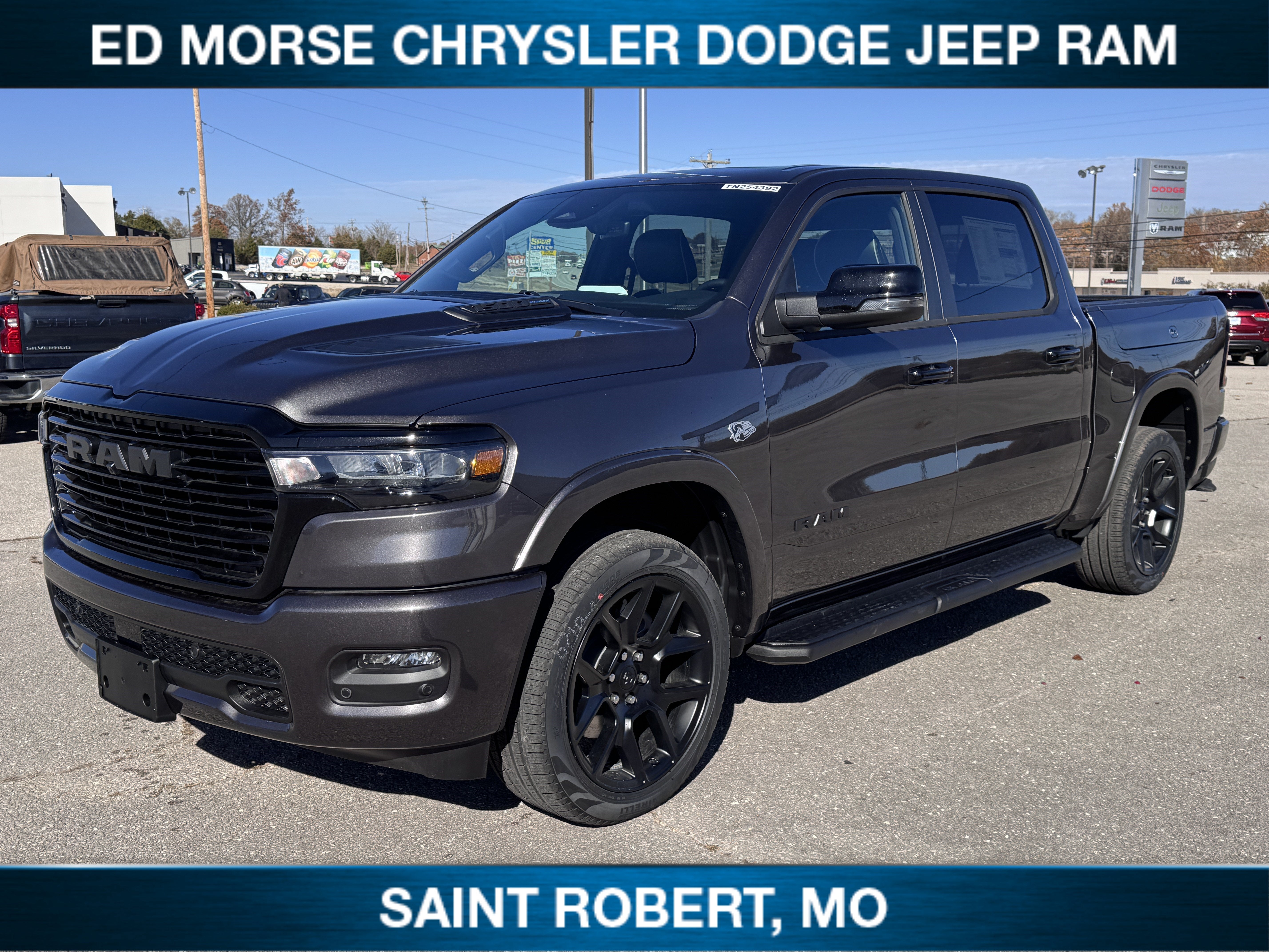 2026 RAM 1500 Laramie in Granite Crystal Metallic Clearcoat — front three-quarter view