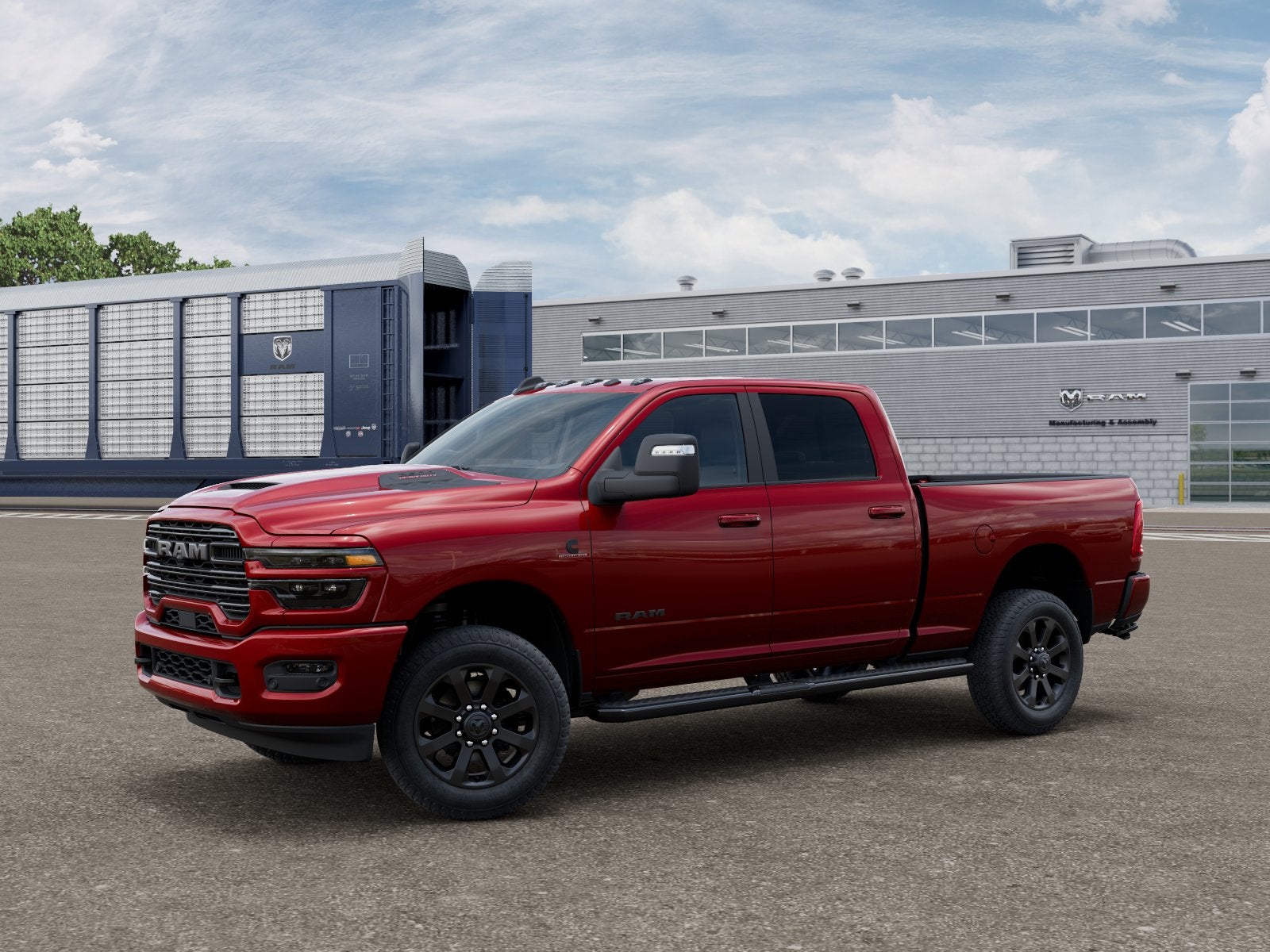 2026 RAM 2500 Laramie in Molten Red Pearlcoat — front three-quarter view