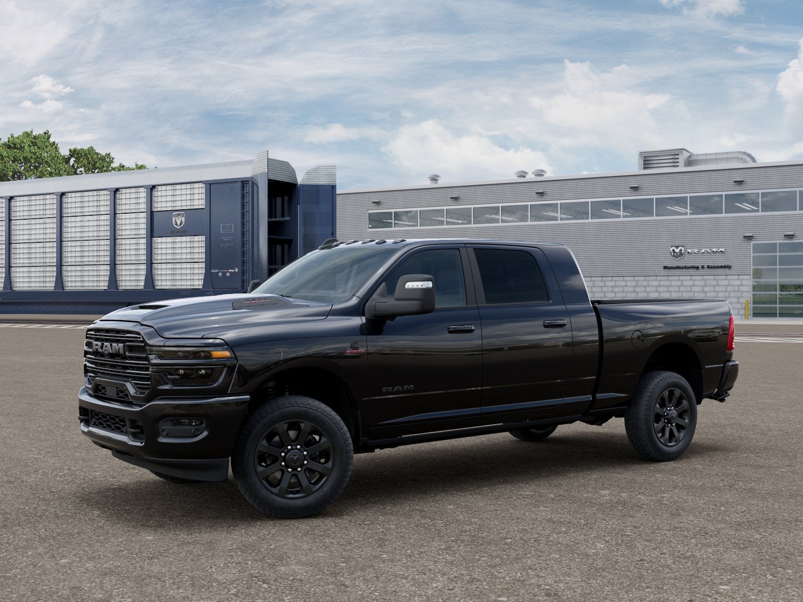 2026 RAM 2500 Laramie in Diamond Black Crystal Pearlcoat — front three-quarter view