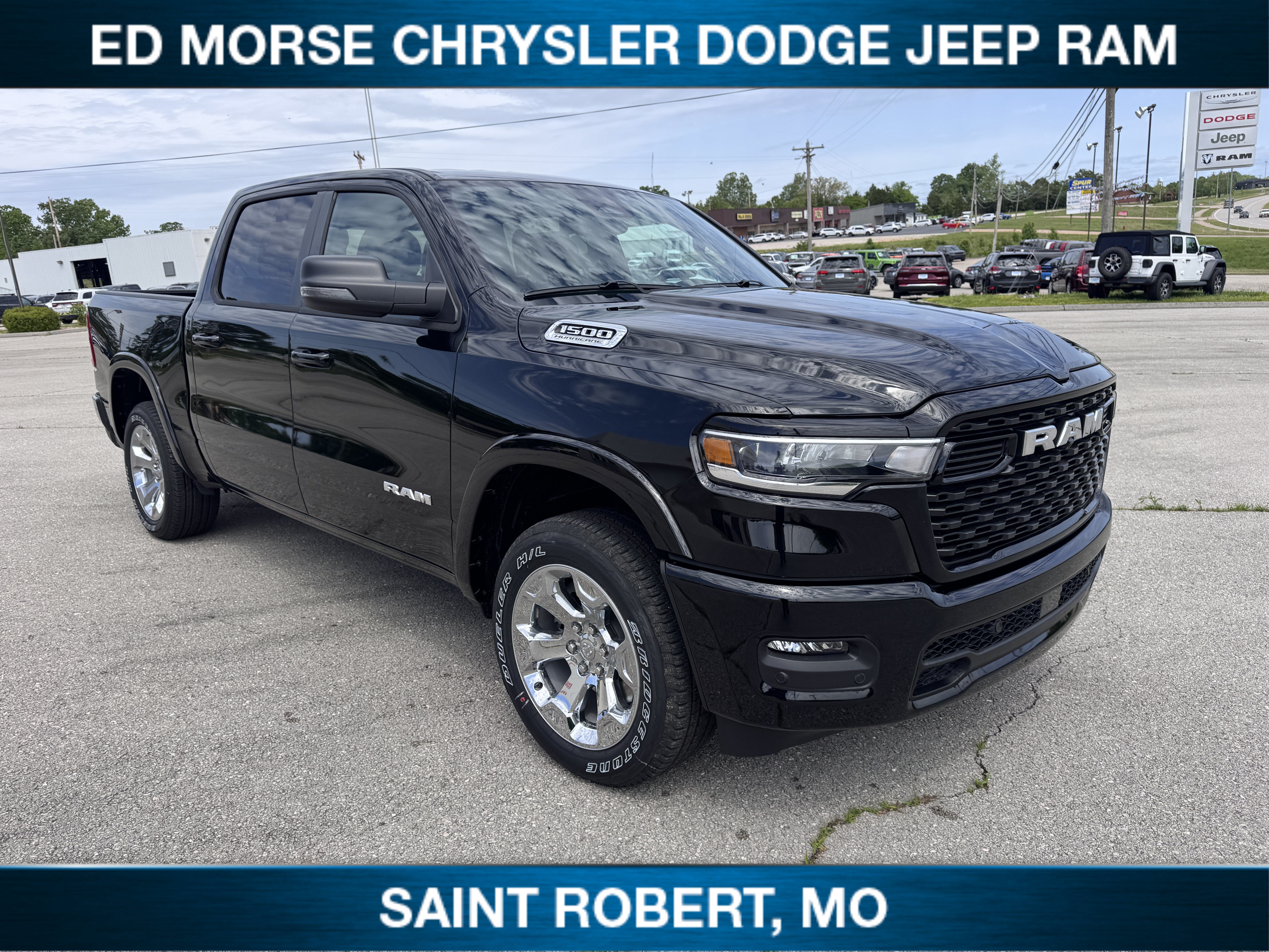 2026 RAM 1500 Big Horn in Diamond Black Crystal Pearlcoat — front three-quarter view
